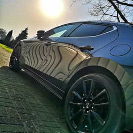 New car and sunny weath...