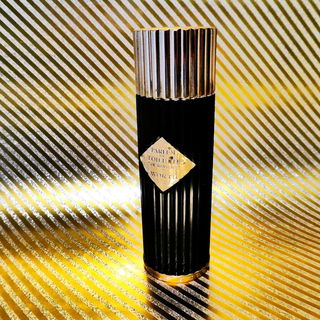 Die Hülle/Boden sind aus Messing und Bakelit, kann man unten aufschrauben und einen Refill-Flakon einsetzen.