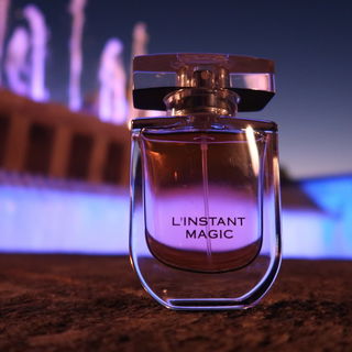 Eine wechselfarbige Fontäne, ein Glas Sekt in der Hand und der richtige Duft, ein L'Instant Magic und ganz ohne  Fotobearbeitung.
