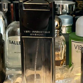 Grabbed my empty bottle for a sniff. Got 1 spritz out of it :). Still loving it.