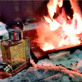 Red campfire in a frozen mountain night..
