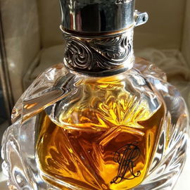 15 ml Parfum im Flakon. Glastop unter der versilberten Kappe.
