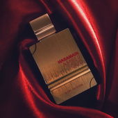 Happy #FragranceFriday! 🌺  Today, I'm excited to share with you my latest challenge- capturing the beauty of this stunning Al Harmain Amber Oud Ruby Edition perfume on camera.  It all started when a friend showed me a video of a perfume photoshoot, and I was immediately inspired to try it out myself. Little did I know, it would be one of the most challenging photos I've taken so far!  The intricate details of the bottle combined with the shiny red cloth made it difficult to capture the true visual essence of the perfume. But after multiple dozen attempts, I'm happy with the final result.  This fragrance is truly one of a kind, with its sweet and rich blend of almond and amber. It's the perfect addition to any perfume collection, especially considering the price. (by Kol)