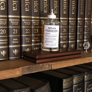 Whispers in the Library - Maison Margiela