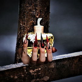 Forbidden Flower is not forbidden ... grabbed by an evil hand ... for Fresh / creepy or funny  :)